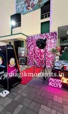 Guests using a Magik Moments booth